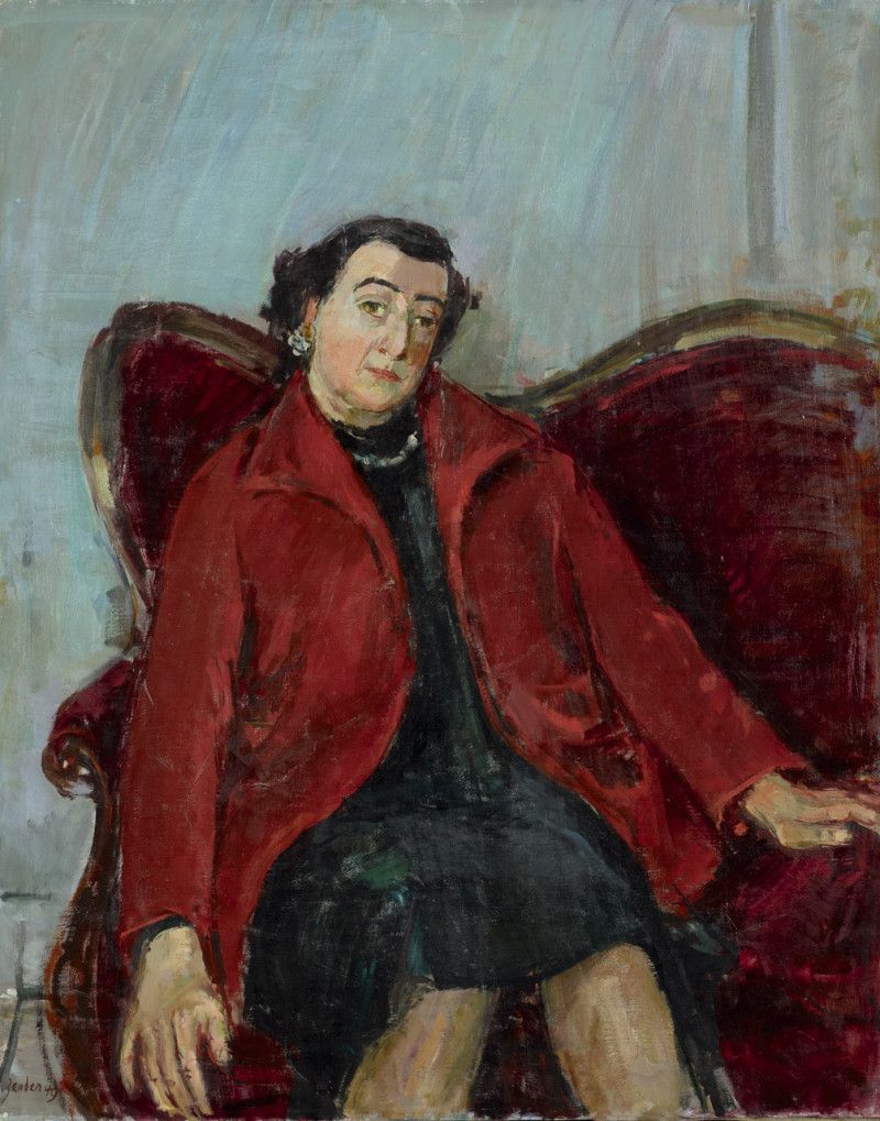 Porträt Frau mit rotem Mantel auf Sofa sitzend, 1947